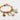 Composition charms sur base bracelet mailles ovales de la gamme GRIGRI - L'Atelier des Dames