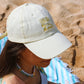 casquette jaune portée sur la plage - l'atelier des dames x broders cap