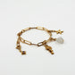 Composition charms sur une base de bracelet mailles rectangles de la gamme GRIGRI - L'Atelier des Dames 
