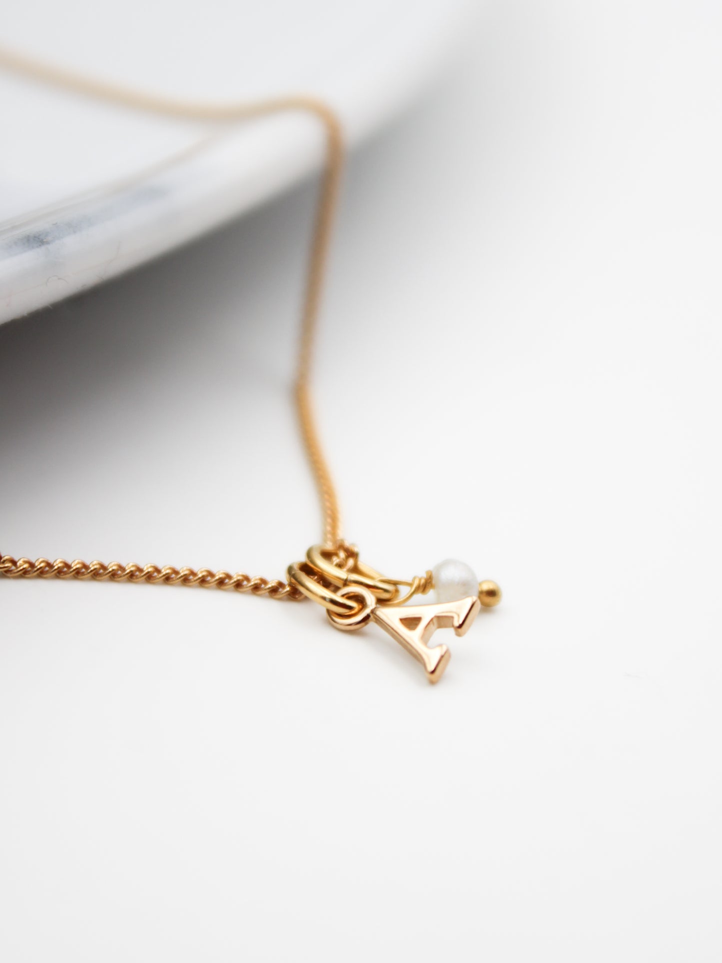 Gold plated initial